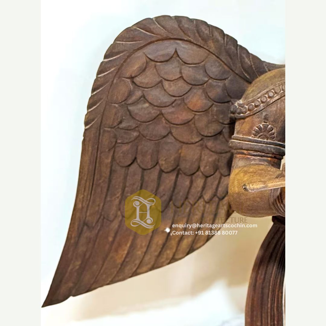 wooden garuda statue in kerala