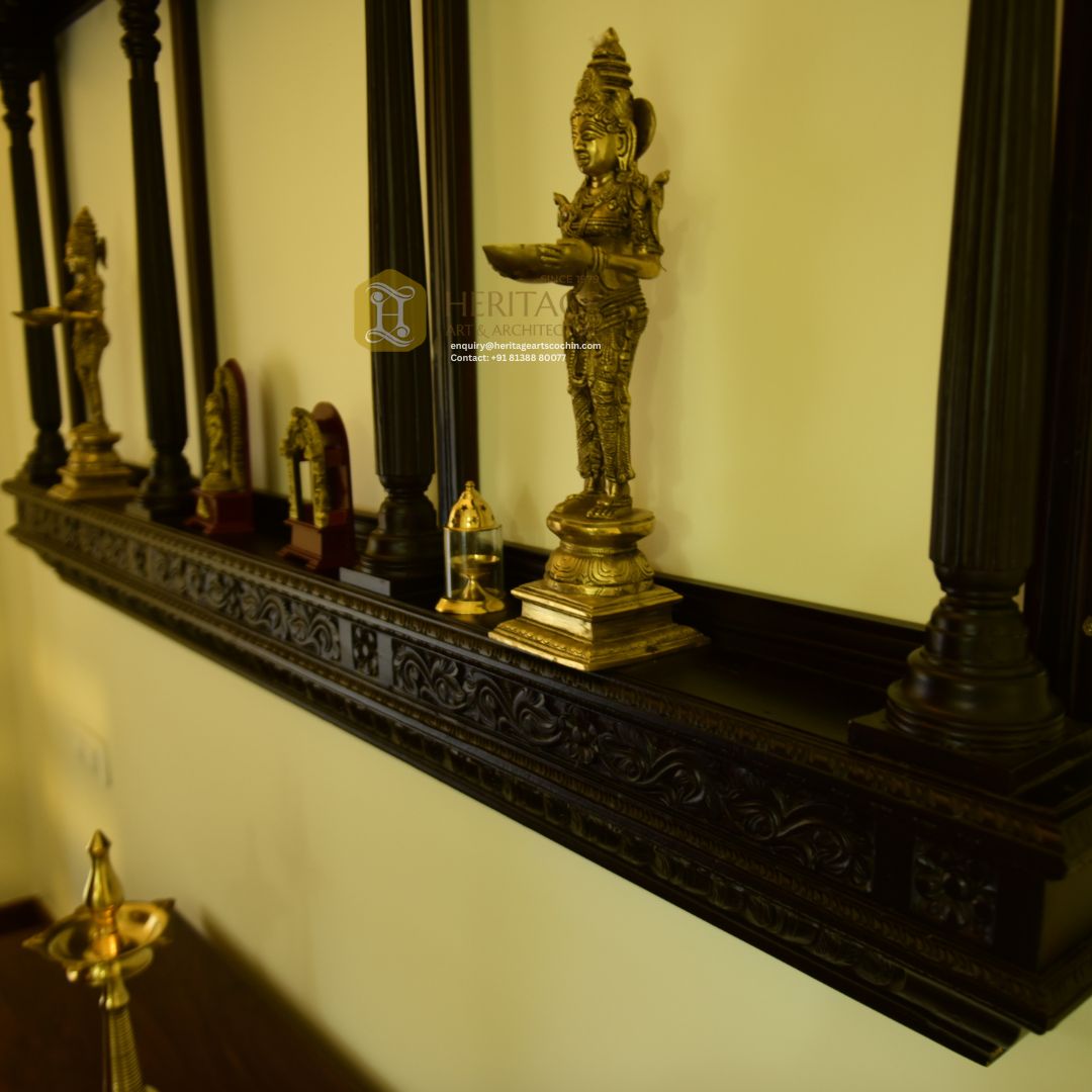 Traditional Kerala wooden pooja altar with brass lamps