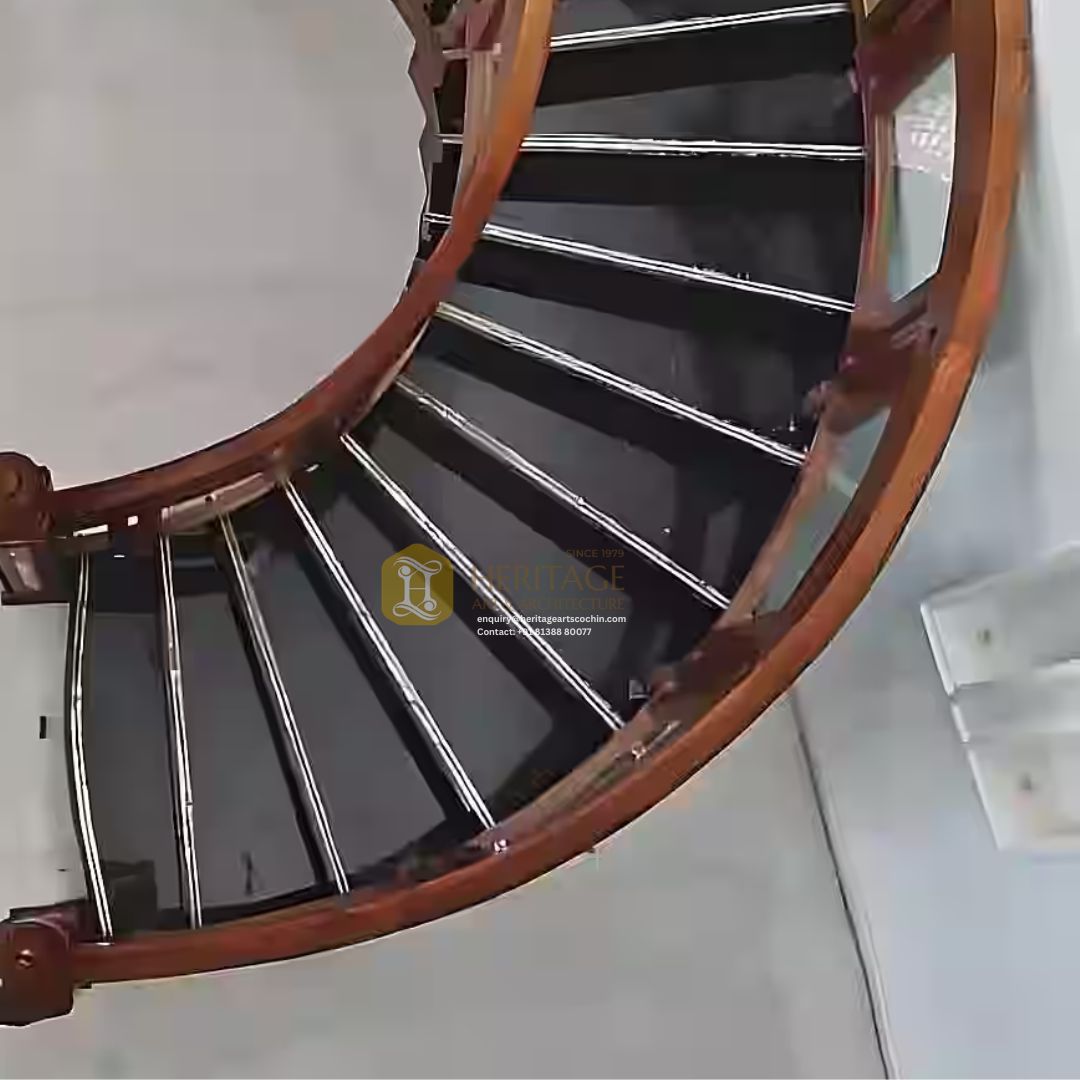 carved wooden spiral staircase in Kerala